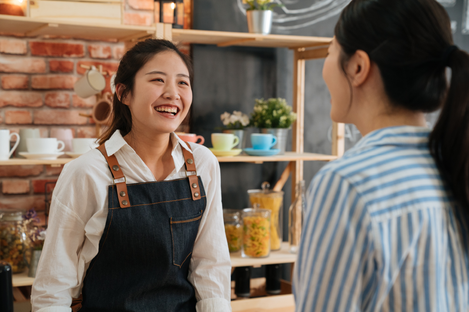 woman smiling greeting a customer
