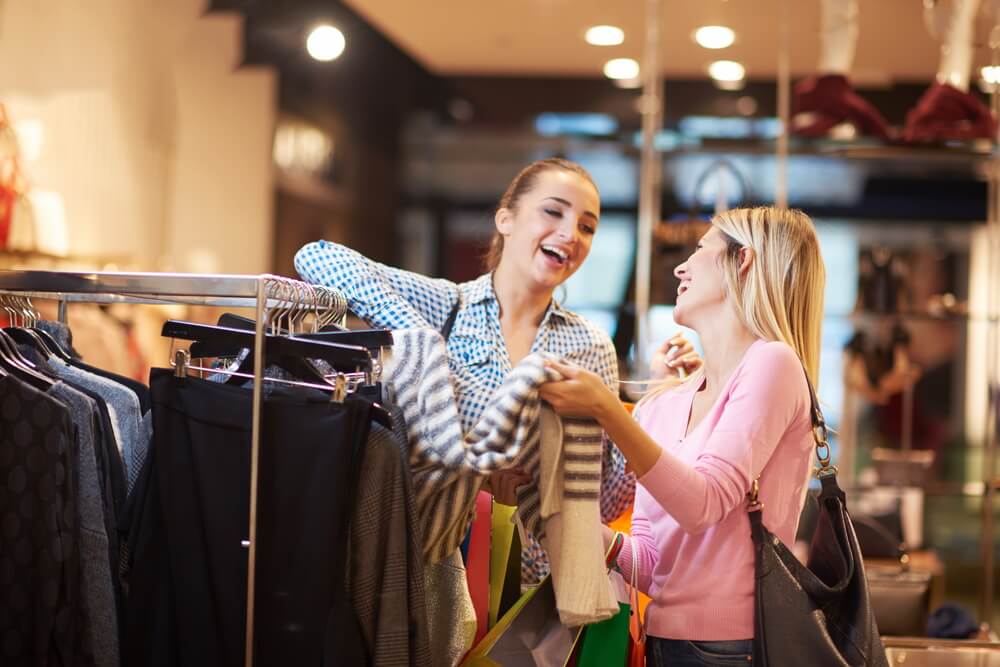 tab4-happy young girls in shopping mall, friends having fun together